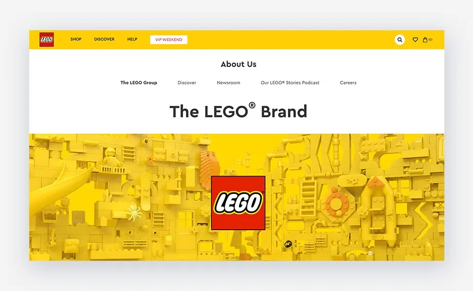 a yellow lego wall with a red square